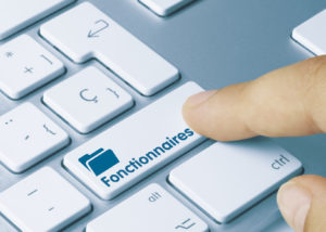 Fonctionnaires écrit sur une touche de clavier